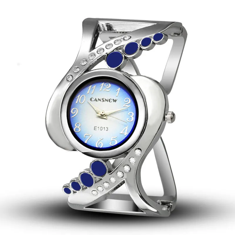 Ladies bracelet watch with white dial, stainless steel case, and alloy band on a neutral background
