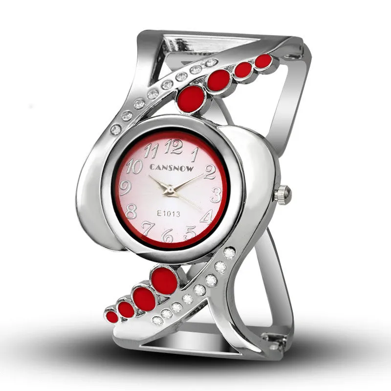 Ladies bracelet watch with white dial, stainless steel case, and alloy band on a neutral background