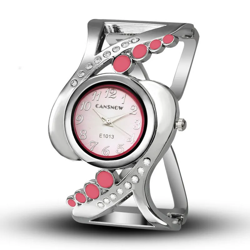 Ladies bracelet watch with white dial, stainless steel case, and alloy band on a neutral background