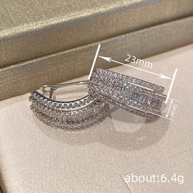 Women's geometric copper stud earrings with white gold plating and small zircon stones