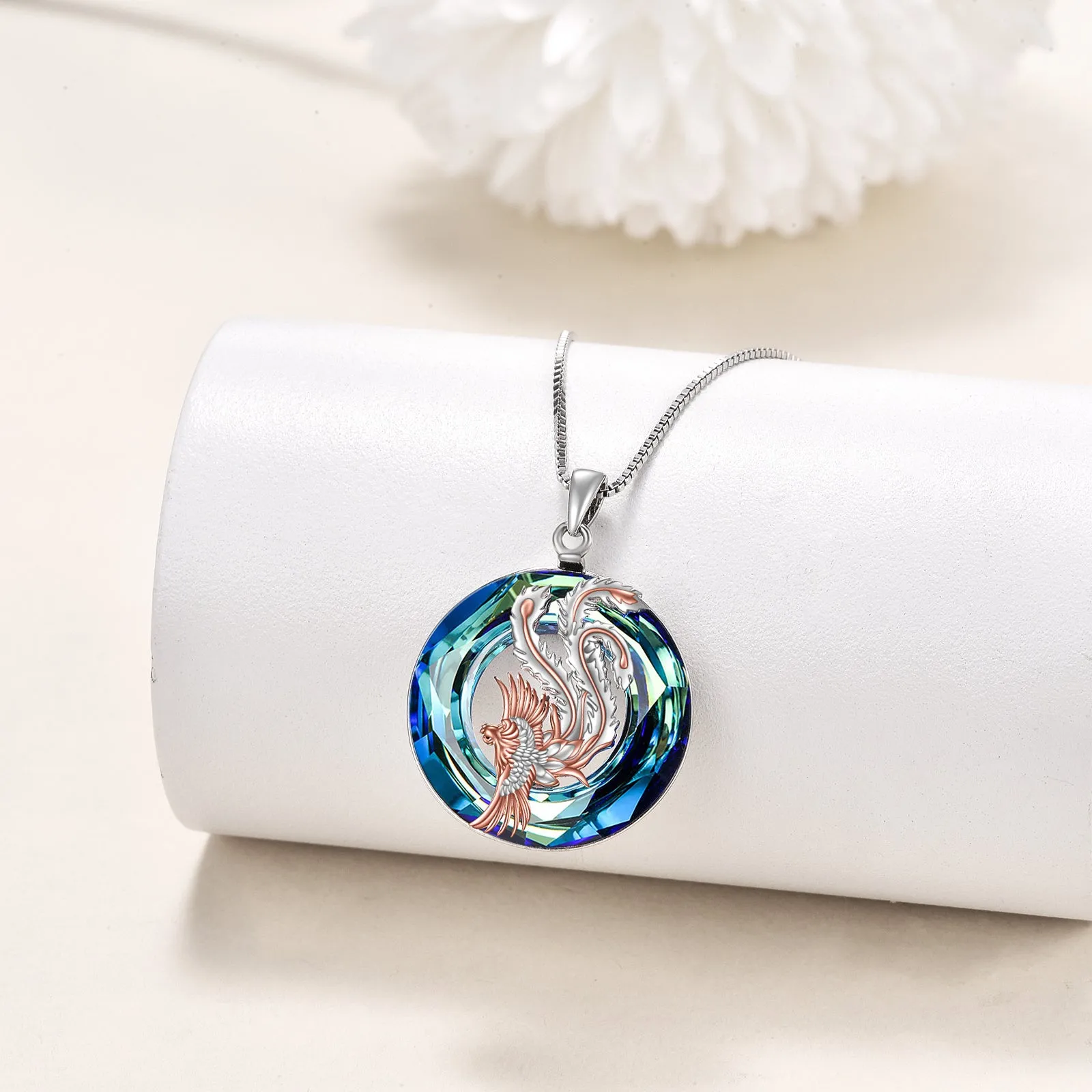 Nirvana Phoenix pendant necklace in sterling silver with crystal stone on silver box chain