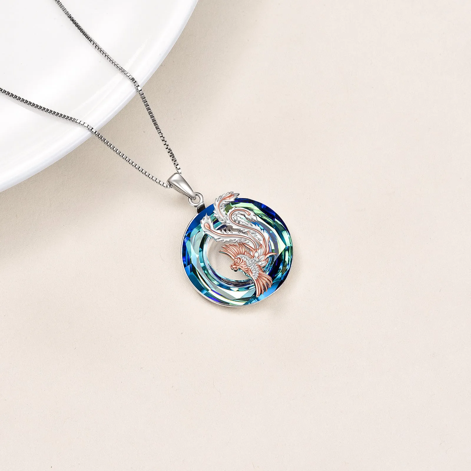Nirvana Phoenix pendant necklace in sterling silver with crystal stone on silver box chain