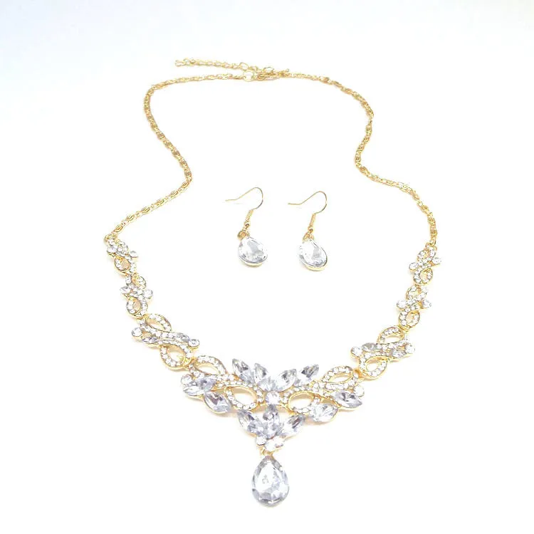 Gold alloy clavicle chain necklace with bow pendant on display