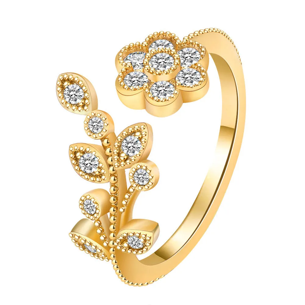 Women's diamond flower leaves open ring in gold and white colour options showing floral design