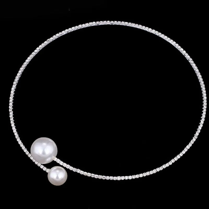Bridal crystal pearl diamond drill collar necklace and bracelet set in gold and silver tones on white background