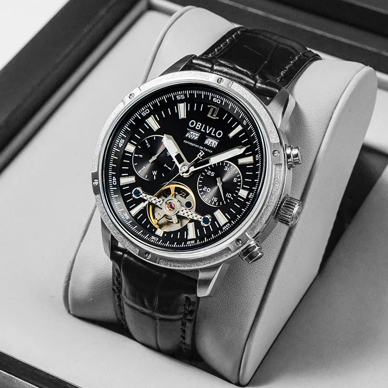 Men's multi-functional hollowed fashion watch with date display, steel strap, silver blue colour