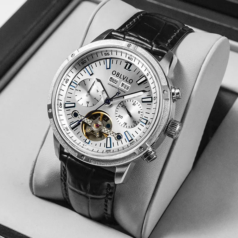 Men's multi-functional hollowed fashion watch with date display, steel strap, silver blue colour