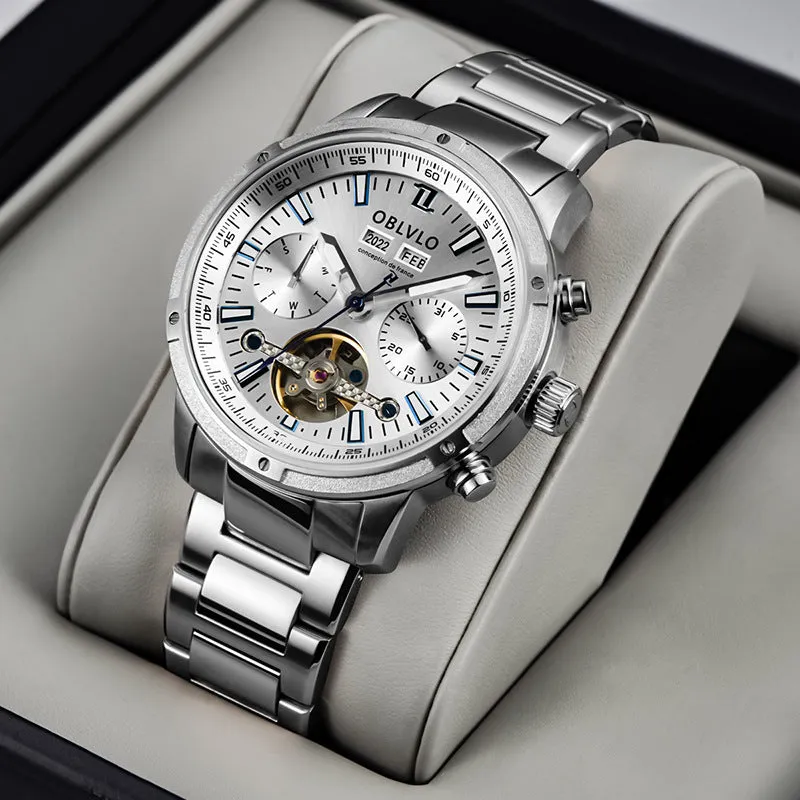 Men's multi-functional hollowed fashion watch with date display, steel strap, silver blue colour