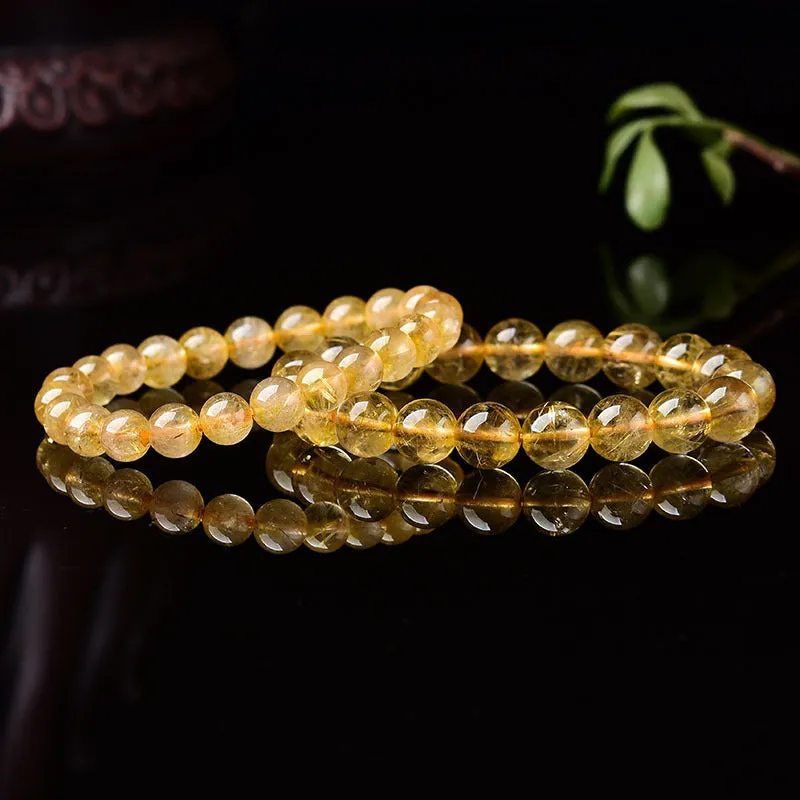 Natural crystal bracelet with 10mm clear beads on 19cm circumference elastic cord