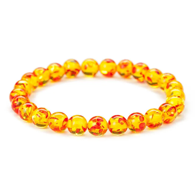 Natural crystal bracelet with 10mm clear beads on 19cm circumference elastic cord