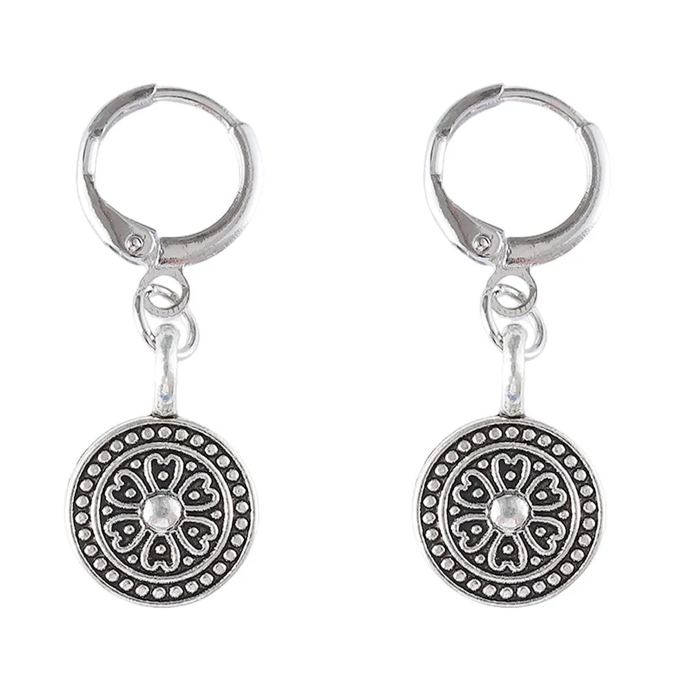 A pair of geometric Bohemian-style retro earrings with a distressed round ethnic print on zinc alloy.