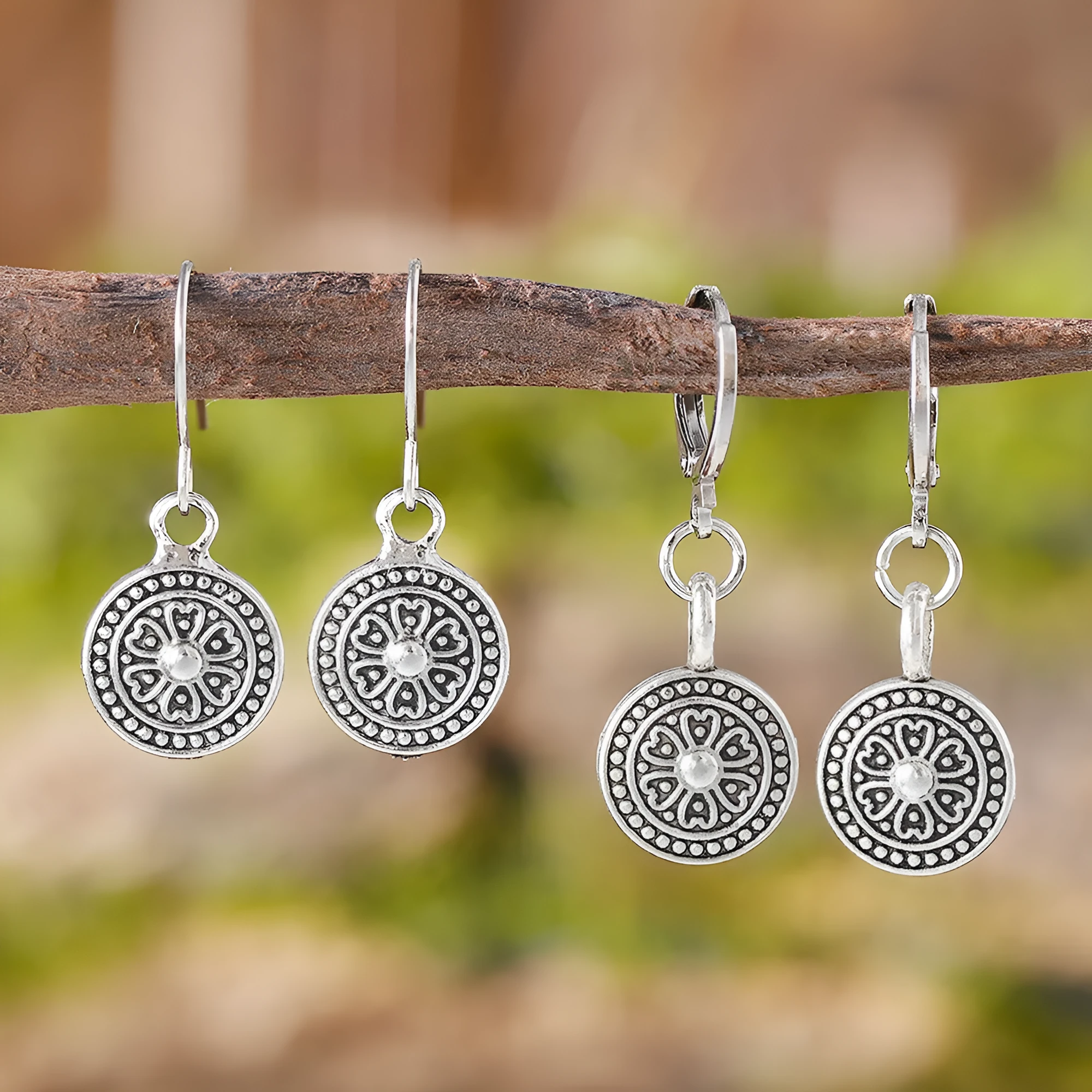 A pair of geometric Bohemian-style retro earrings with a distressed round ethnic print on zinc alloy.