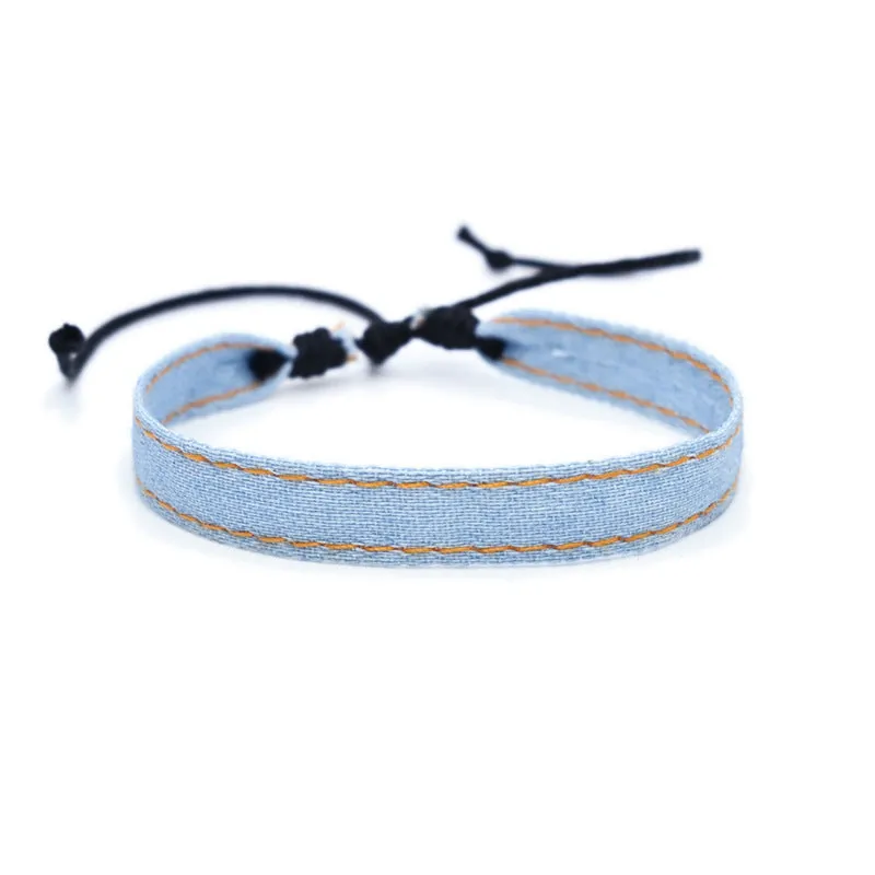 Denim fabric bracelet strap with mixed materials in one of eleven colour options for travel memorial use