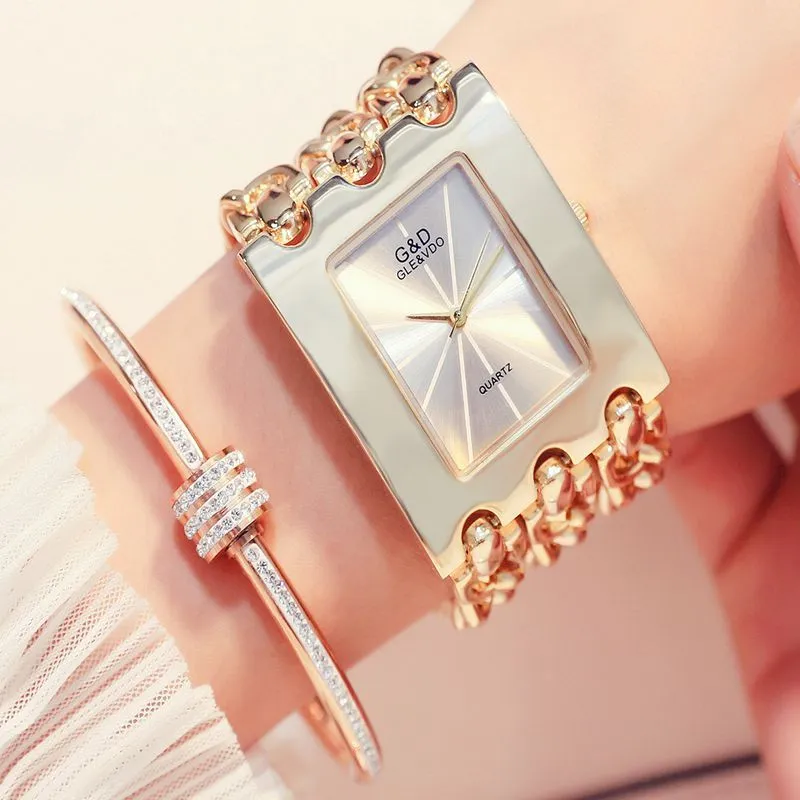 Womens quartz watch with stainless steel strap, 40mm silver dial, and analogue display