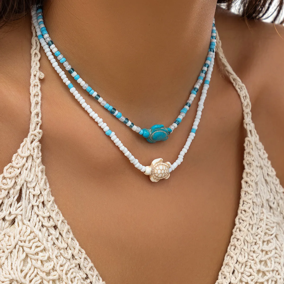 Starfish shell necklace for women, vacation style, ball bead chain, acrylic pendant with five-pointed star and tassel, white colour, set of 2