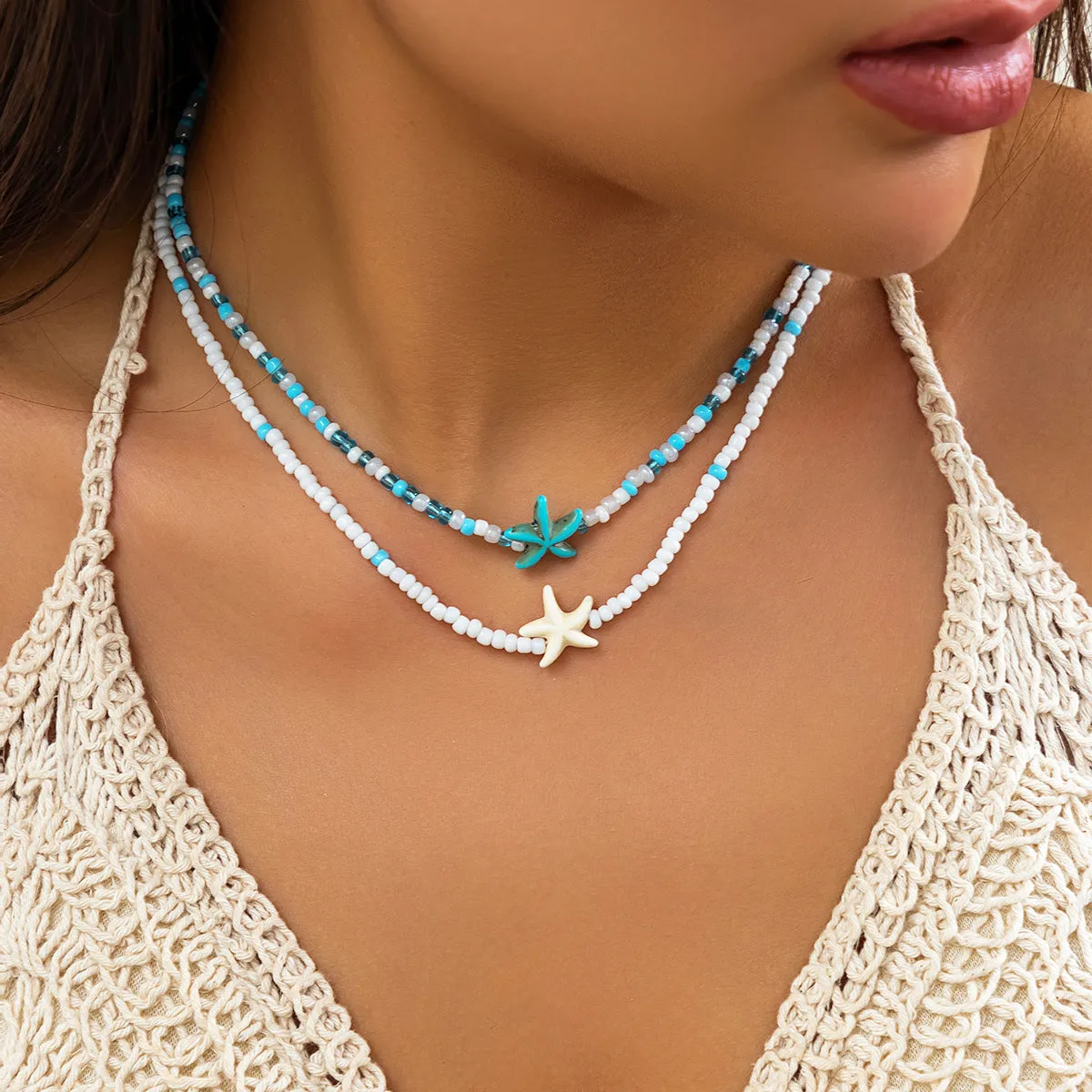 Starfish shell necklace for women, vacation style, ball bead chain, acrylic pendant with five-pointed star and tassel, white colour, set of 2