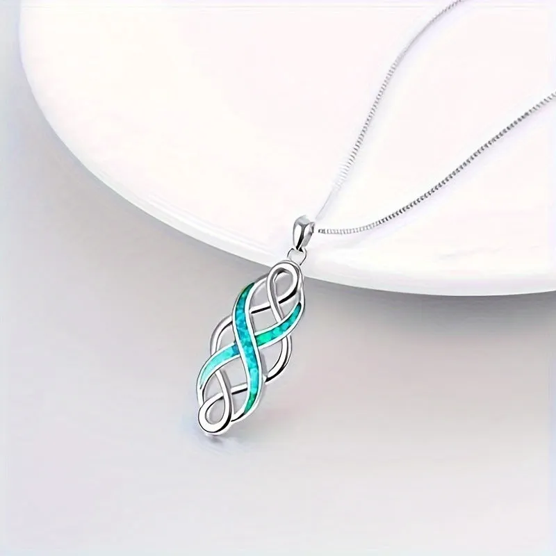 Blue alloy Irish Celtic pendant necklace on cross chain with ellipse and ring motif