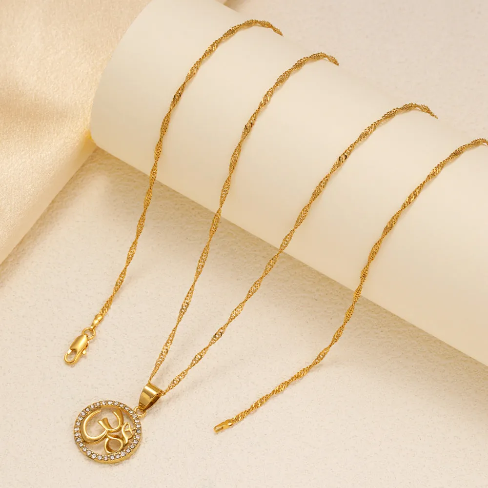 Gold plated copper circular pendant necklace with diamond edge inlay and OM symbol