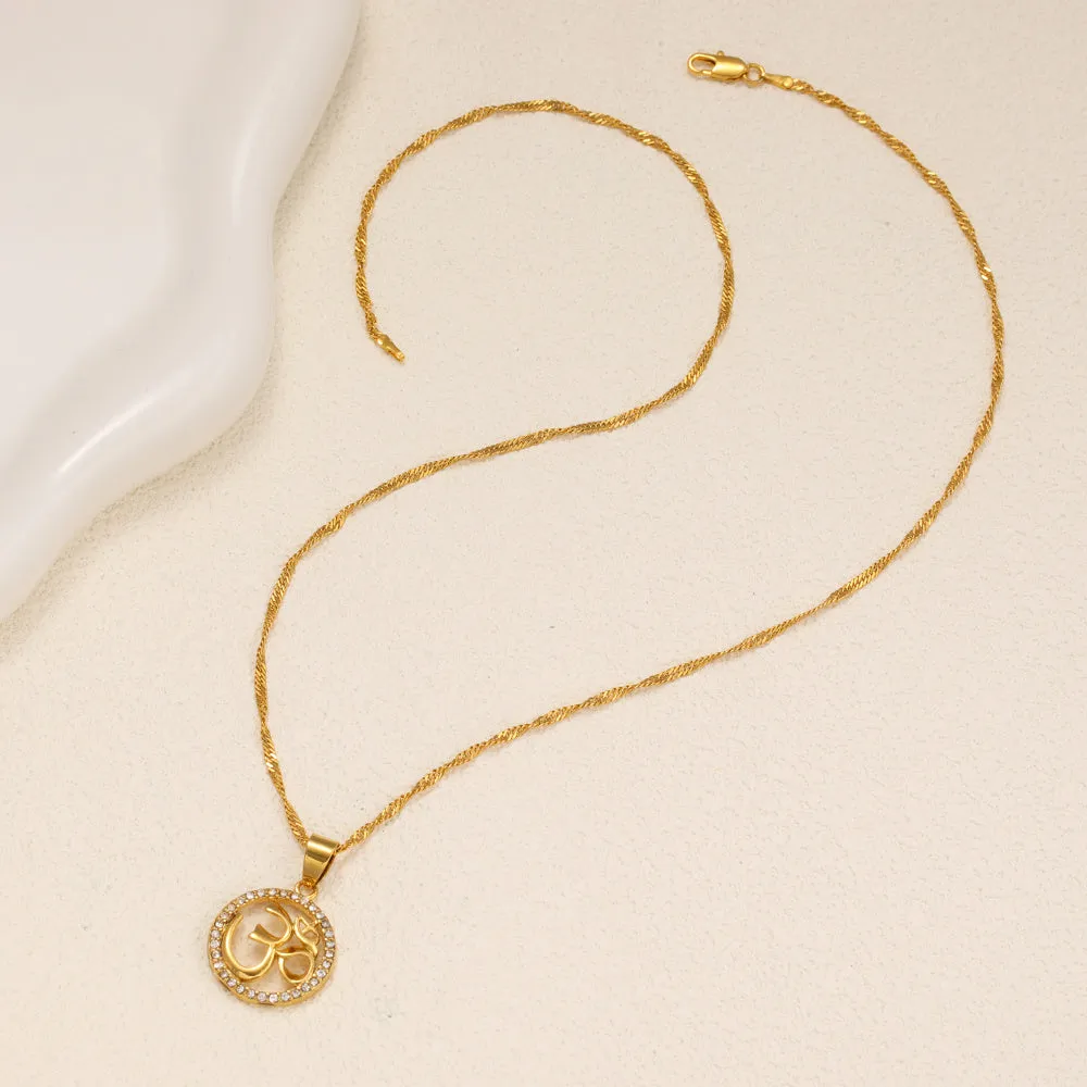 Gold plated copper circular pendant necklace with diamond edge inlay and OM symbol