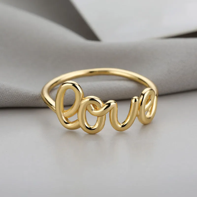 Small unisex copper LOVE ring with engraved text in gold finish for couples