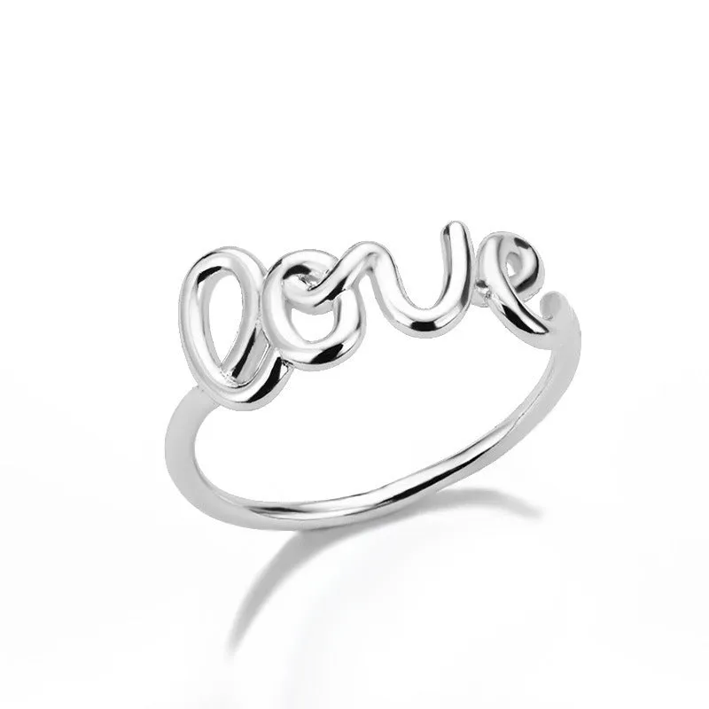 Small unisex copper LOVE ring with engraved text in gold finish for couples