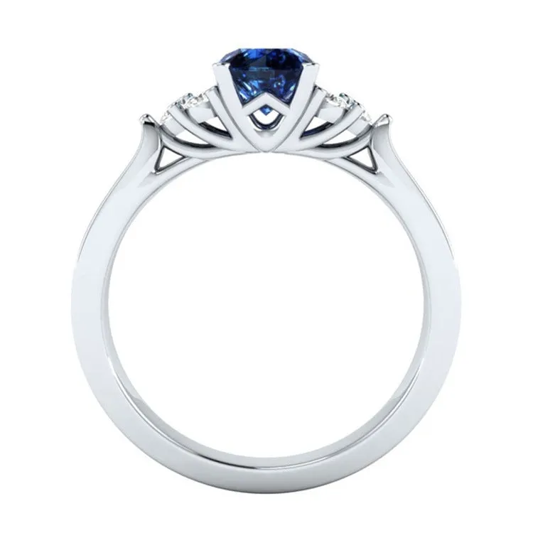 New inlaid sapphire zircon ring in 925 silver princess engagement ring on display