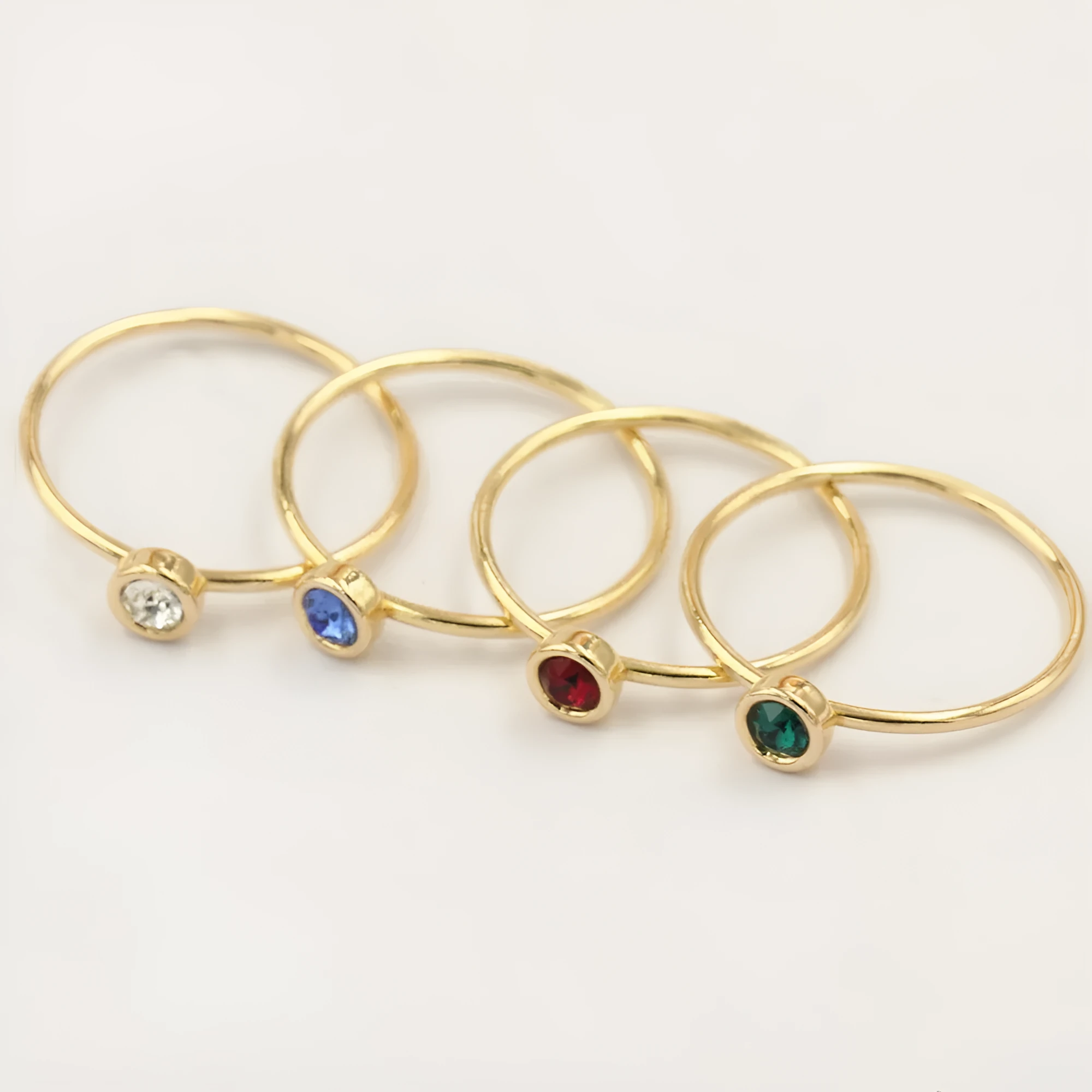 Women's copper knuckle ring with 14K gilded finish and GF zircon detailing in four colour options