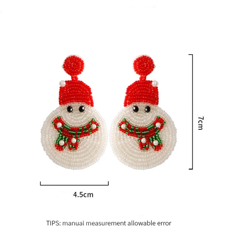 White acrylic snowman bead earrings on a white background, geometric shape, one pair shown
