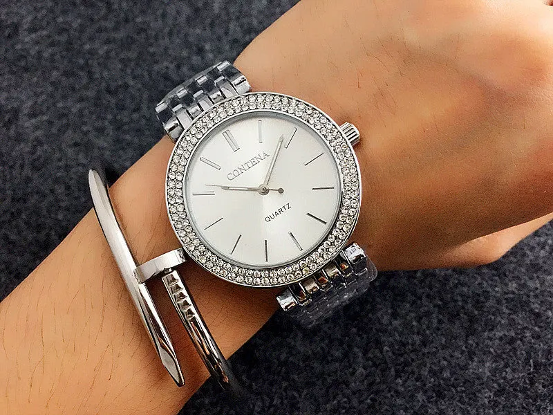 Women's round alloy case quartz watch with stainless steel band in gold, silver, and rose gold