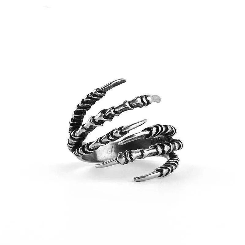 Adjustable paw ring in electroplated metal on index finger, dragon motif, unisex fashion jewelry
