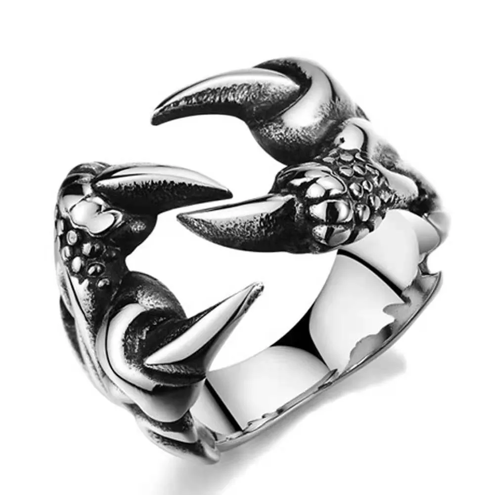 Adjustable paw ring in electroplated metal on index finger, dragon motif, unisex fashion jewelry