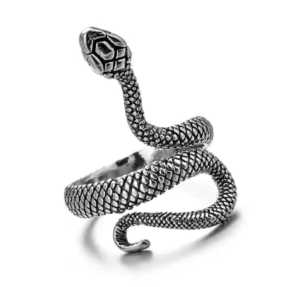 Adjustable paw ring in electroplated metal on index finger, dragon motif, unisex fashion jewelry