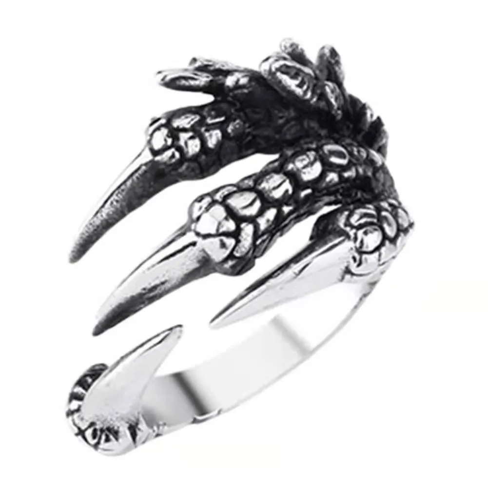 Adjustable paw ring in electroplated metal on index finger, dragon motif, unisex fashion jewelry