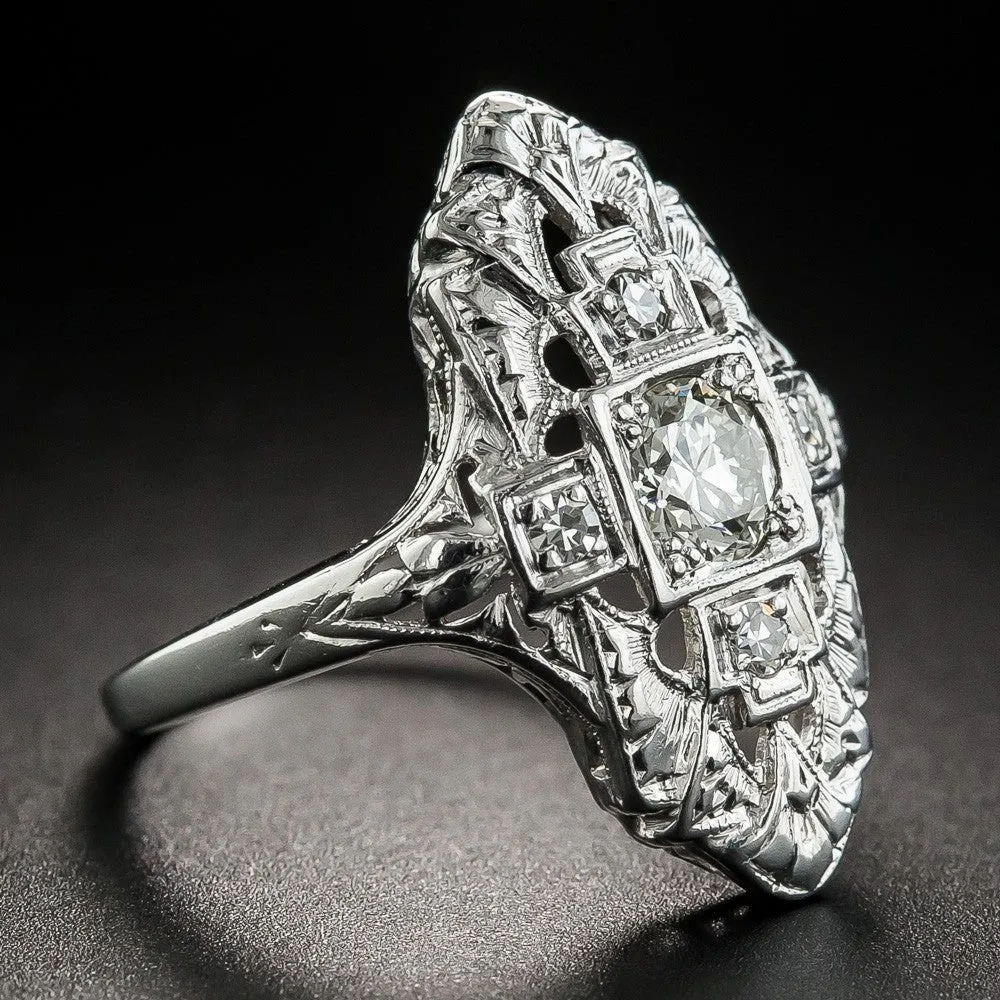 Silver electroplated hollow geometric diamond-studded ring showing negative space band design