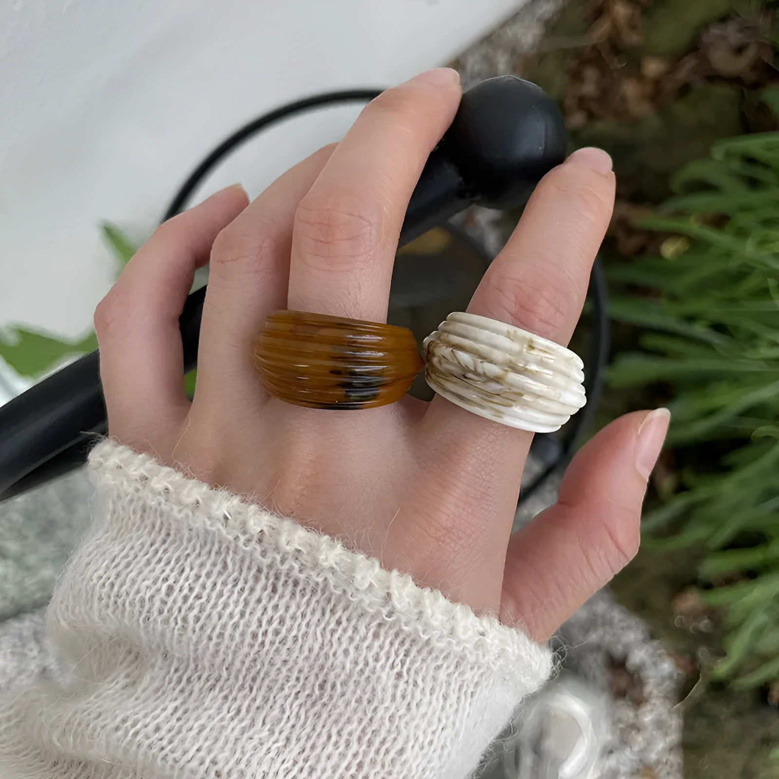 Geometric resin wide ring with irregular Chinese-inspired design in brown and white colours