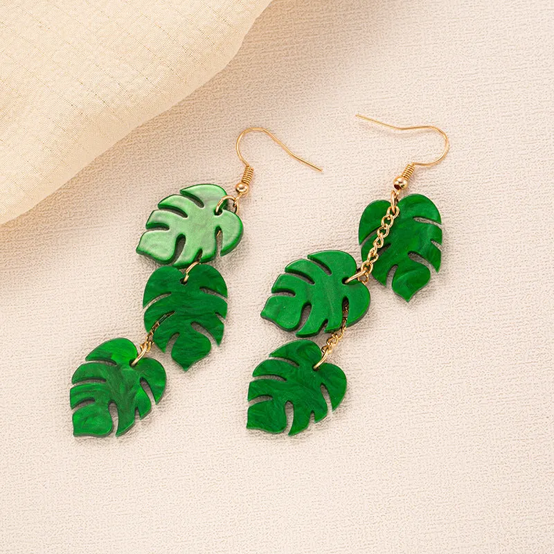 Jackfruit-shaped dangle earrings in acrylic and alloy, shown in one of five colour styles.