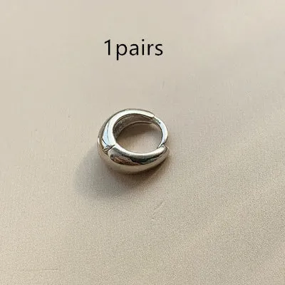 Retro-style geometric water drop earrings for women in gold and silver finishes, showing large, medium, and small sizes.