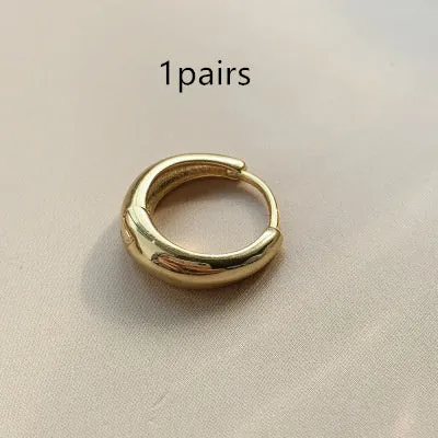 Retro-style geometric water drop earrings for women in gold and silver finishes, showing large, medium, and small sizes.