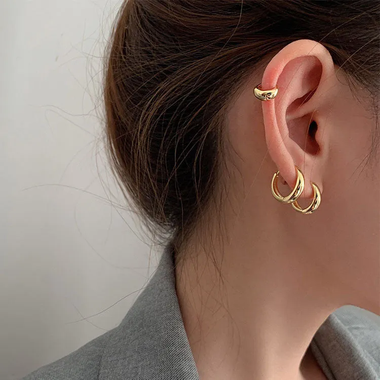 Retro-style geometric water drop earrings for women in gold and silver finishes, showing large, medium, and small sizes.
