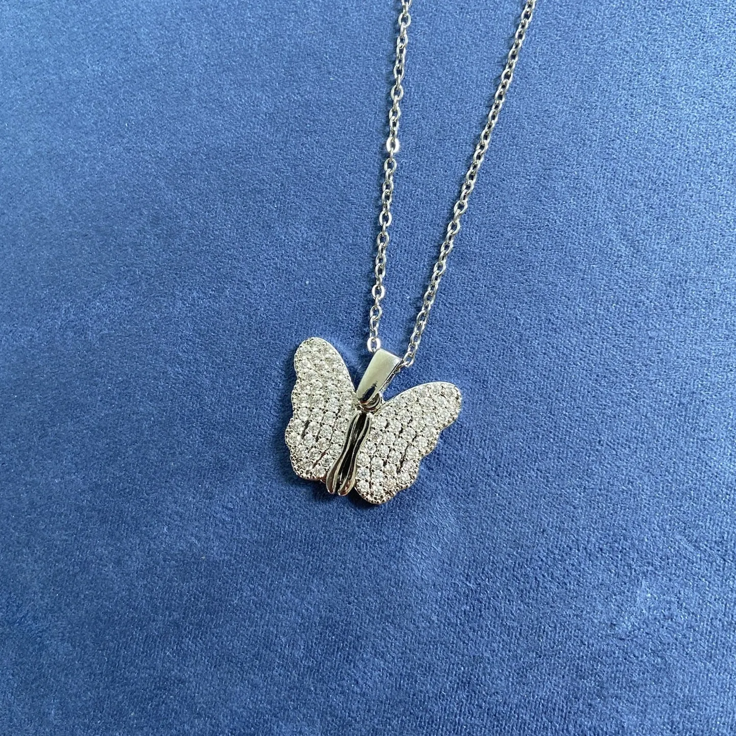 Silver electroplated titanium steel butterfly pendant necklace with openable design on clavicle-length chain