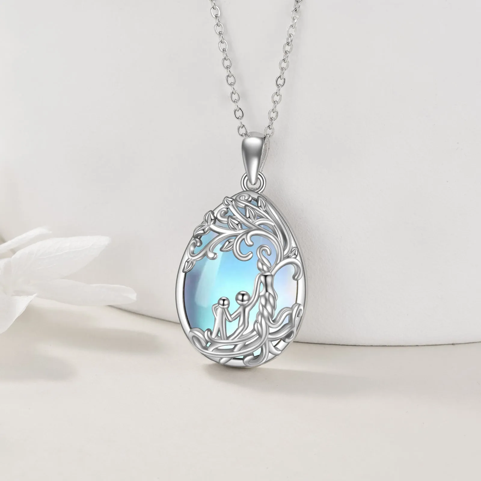 Sterling silver moonstone tree of life pendant with white gold plating on 18-inch cable chain
