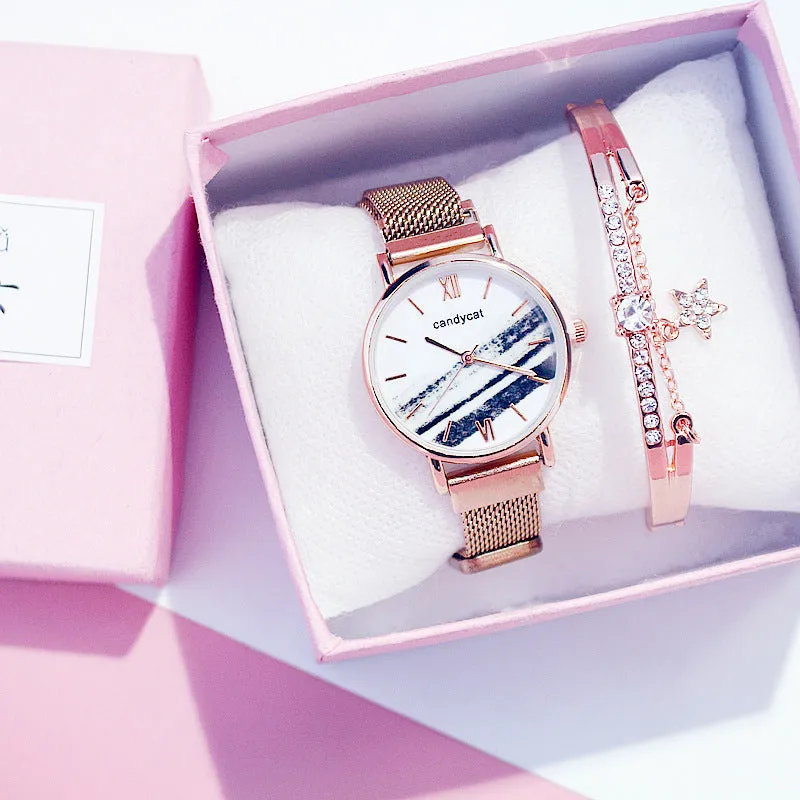 Women's retro marble watch with 32mm round dial, alloy strap, and magnetic buckle on white background