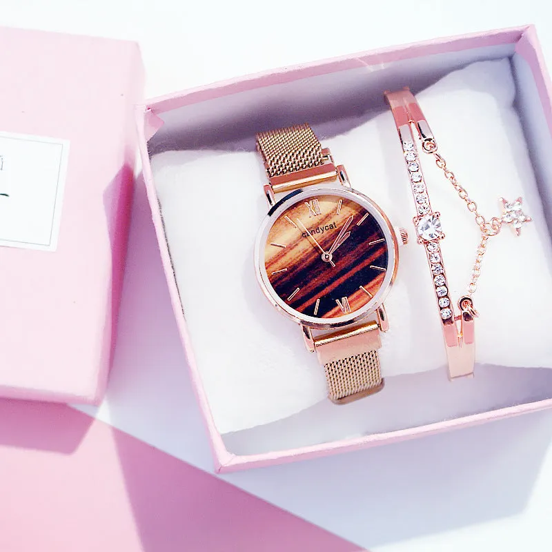 Women's retro marble watch with 32mm round dial, alloy strap, and magnetic buckle on white background