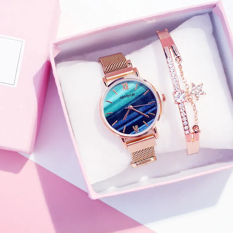 Women's retro marble watch with 32mm round dial, alloy strap, and magnetic buckle on white background