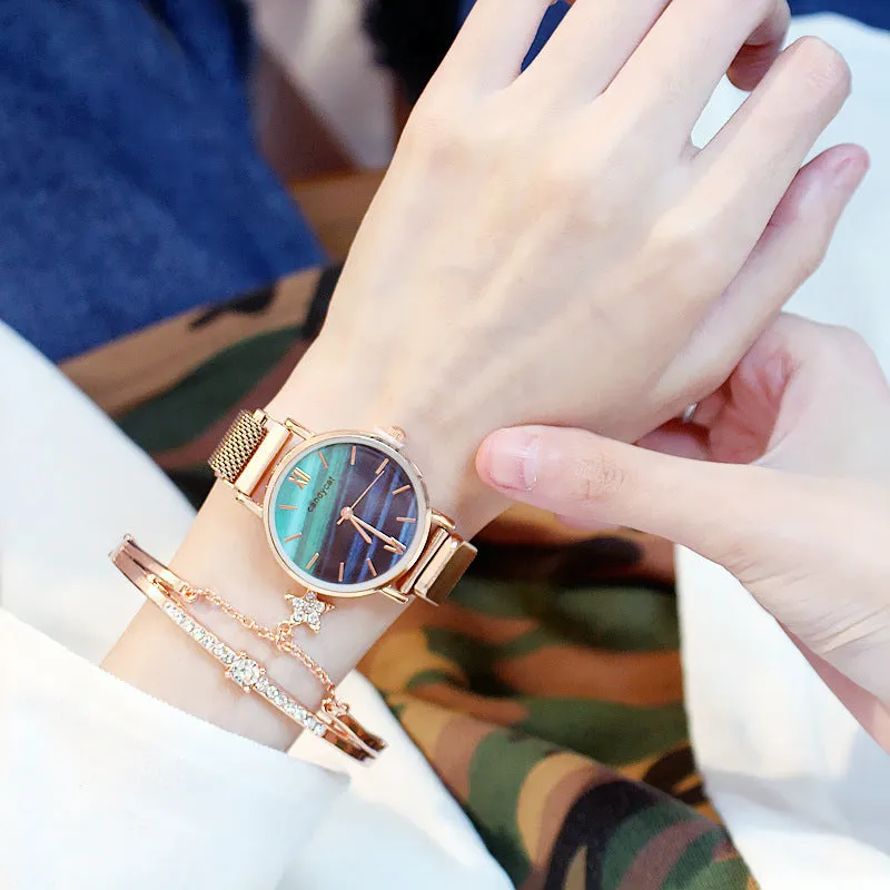 Women's retro marble watch with 32mm round dial, alloy strap, and magnetic buckle on white background