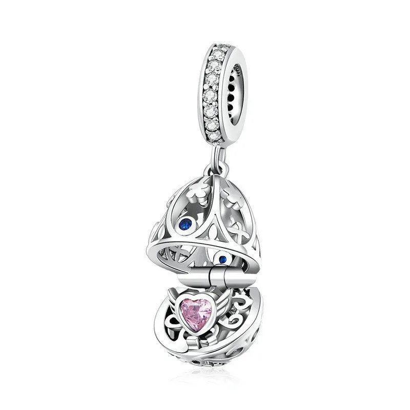 Silver electroplated loose bead pendant 2.3cm high 1cm wide on plain background