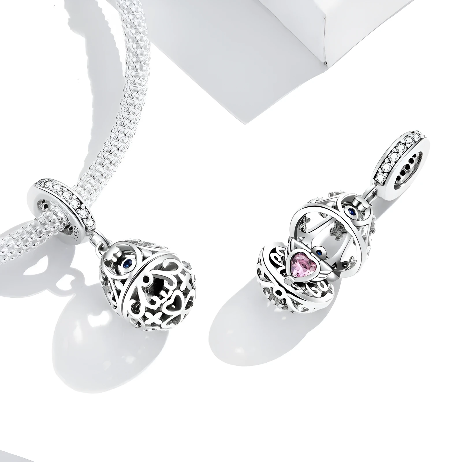 Silver electroplated loose bead pendant 2.3cm high 1cm wide on plain background