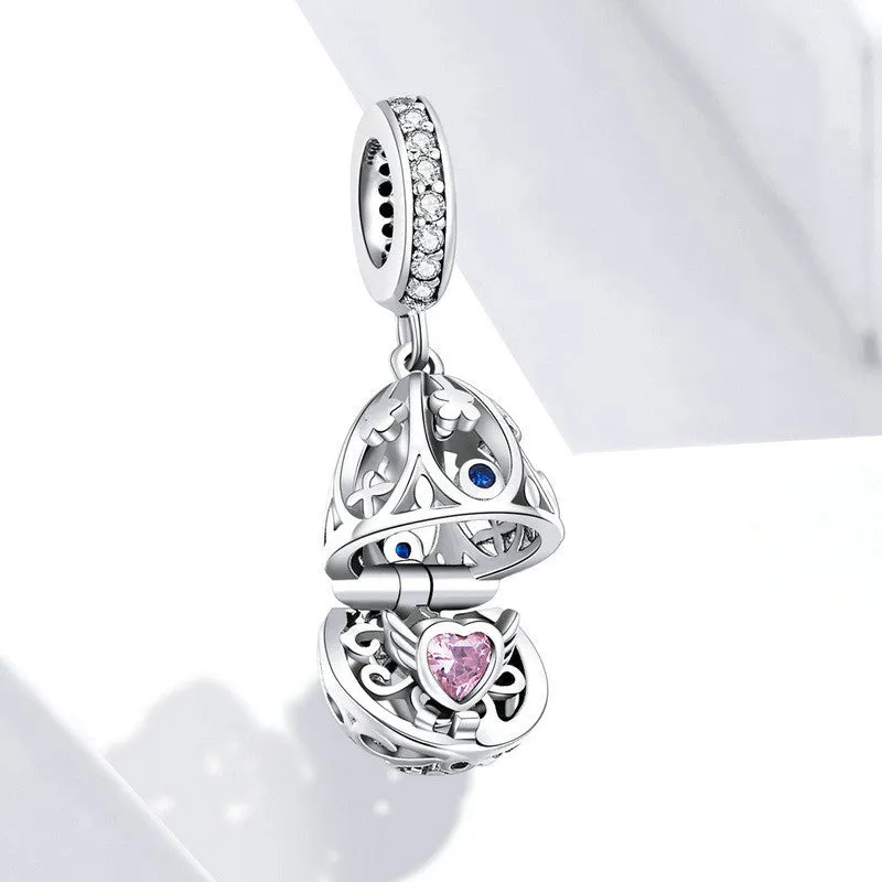 Silver electroplated loose bead pendant 2.3cm high 1cm wide on plain background