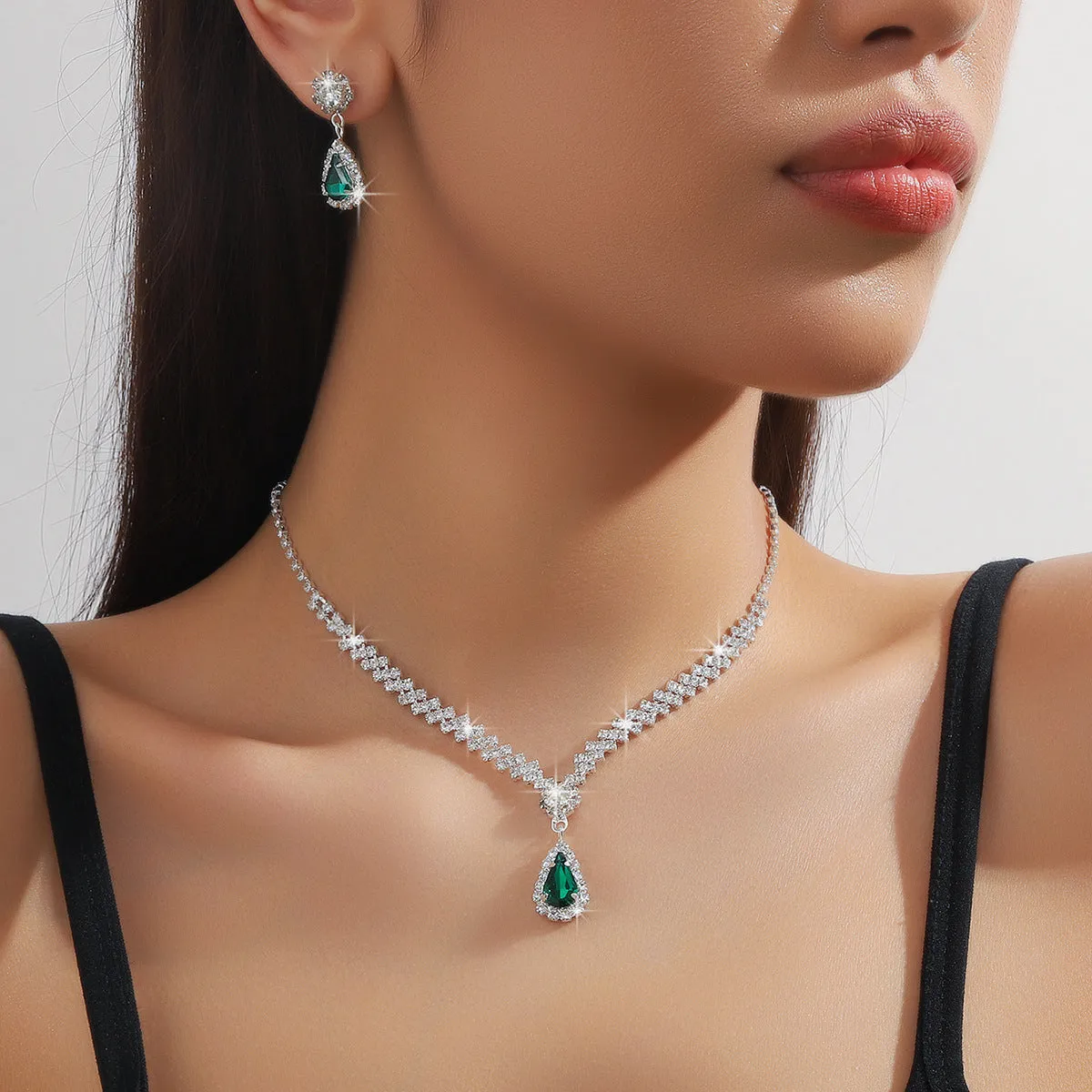 Claw chain necklace and earrings set with water drop rhinestone shapes in multiple colour options