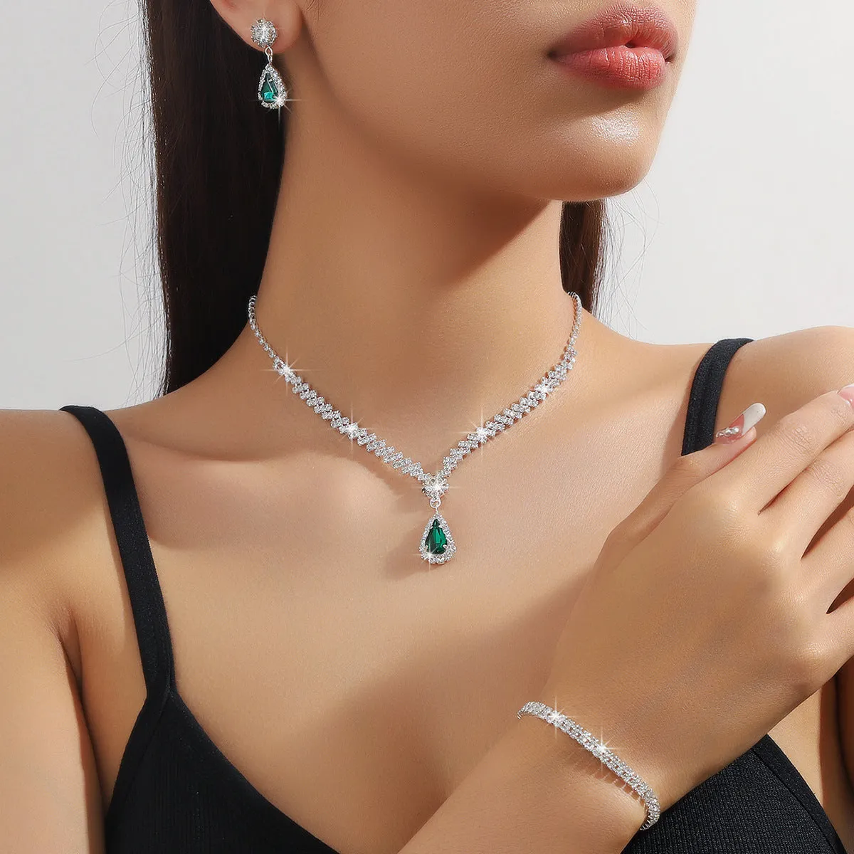 Claw chain necklace and earrings set with water drop rhinestone shapes in multiple colour options